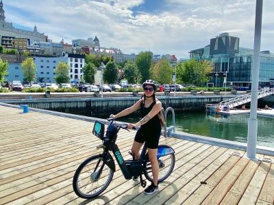 Woman on an electric bike in the Old Port of Quebec