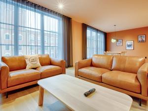 Les Lofts Dorchester - Salon avec grande fenêtre