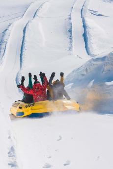A group is rafting on snow at the Village Vacances Valcartier, near Québec City.